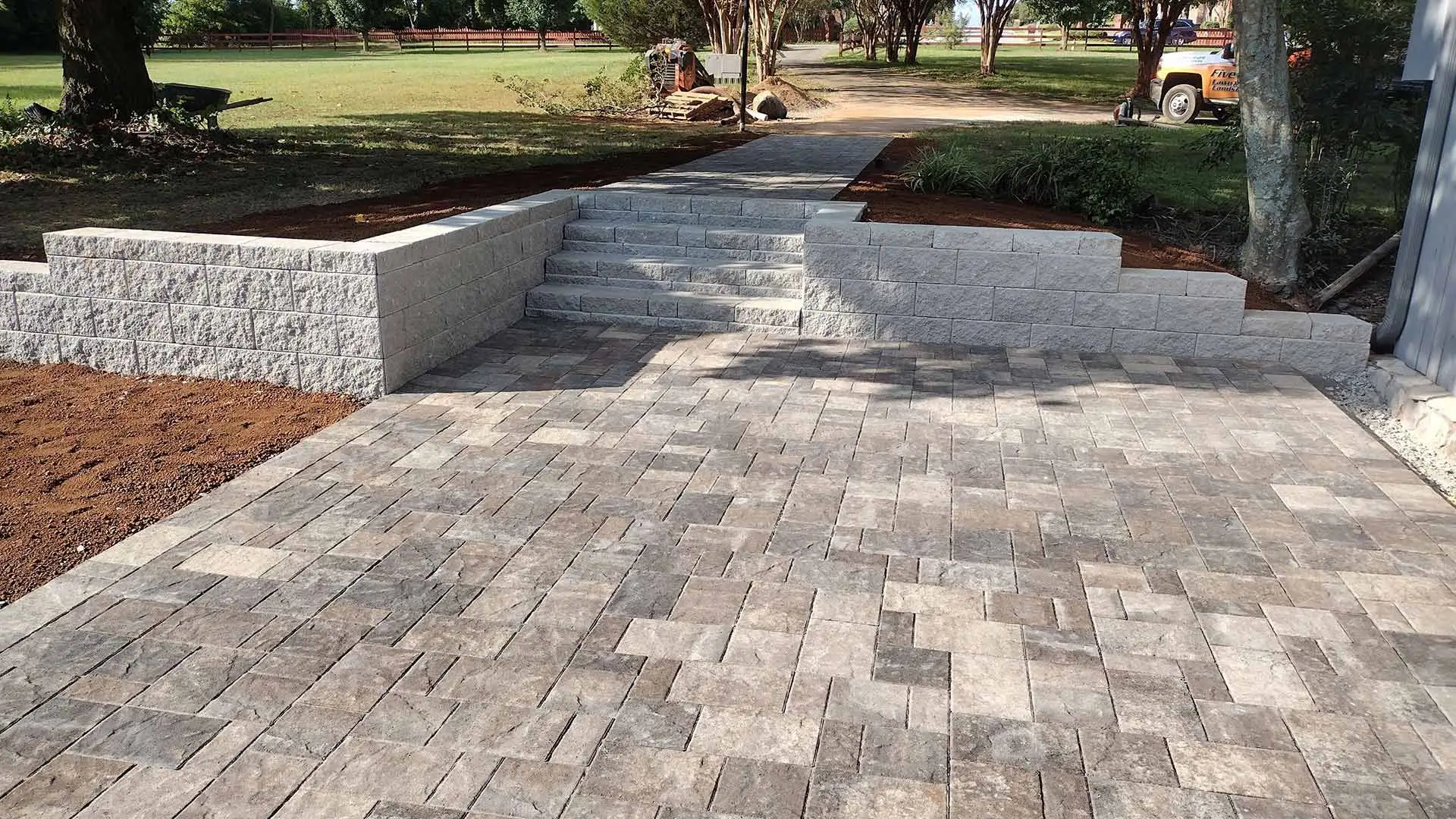 Paver patio installed in a backyard in Meridanville, AL.