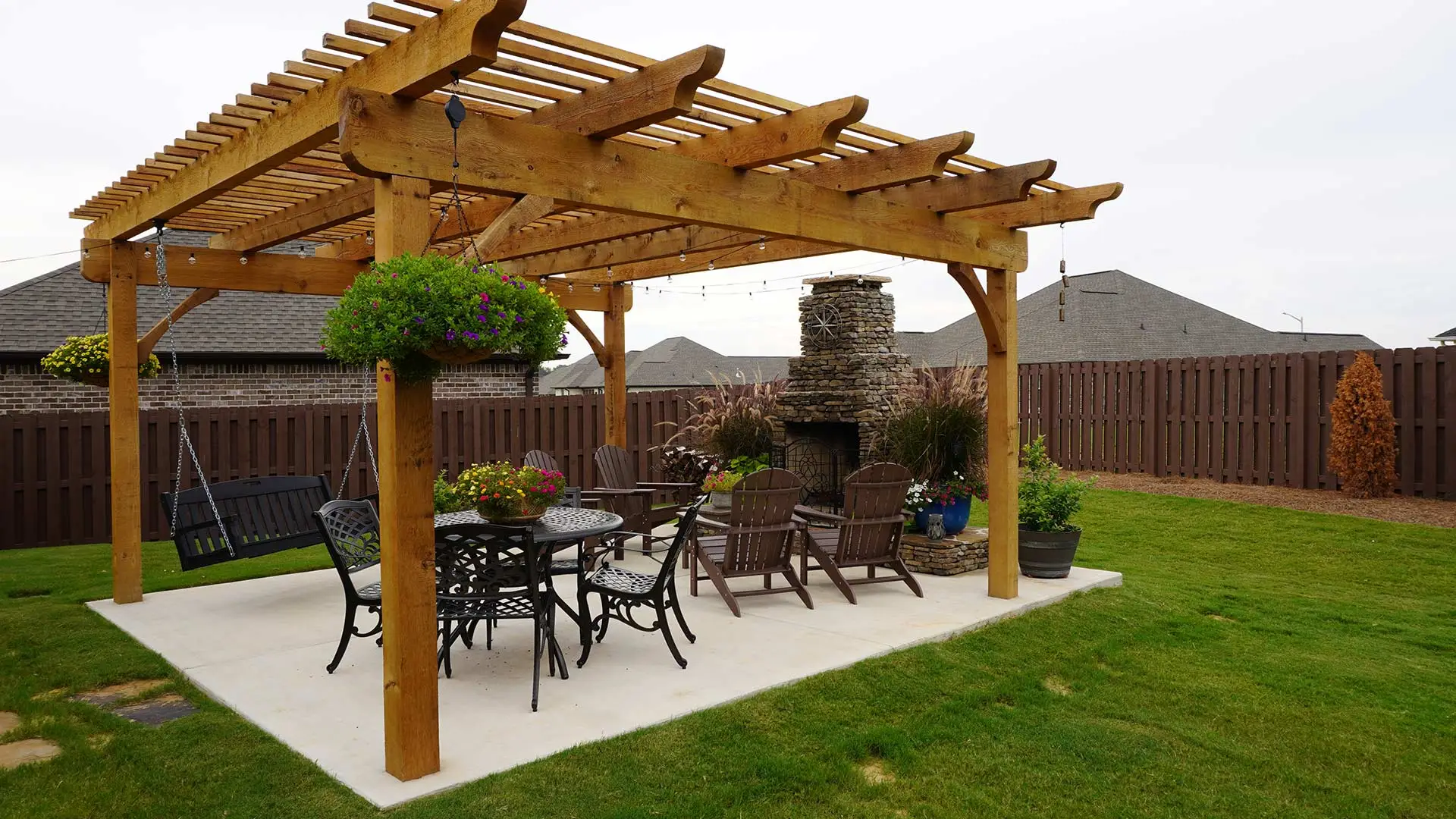 Pergola installed with fireplace over patio in Hazel Green, AL.