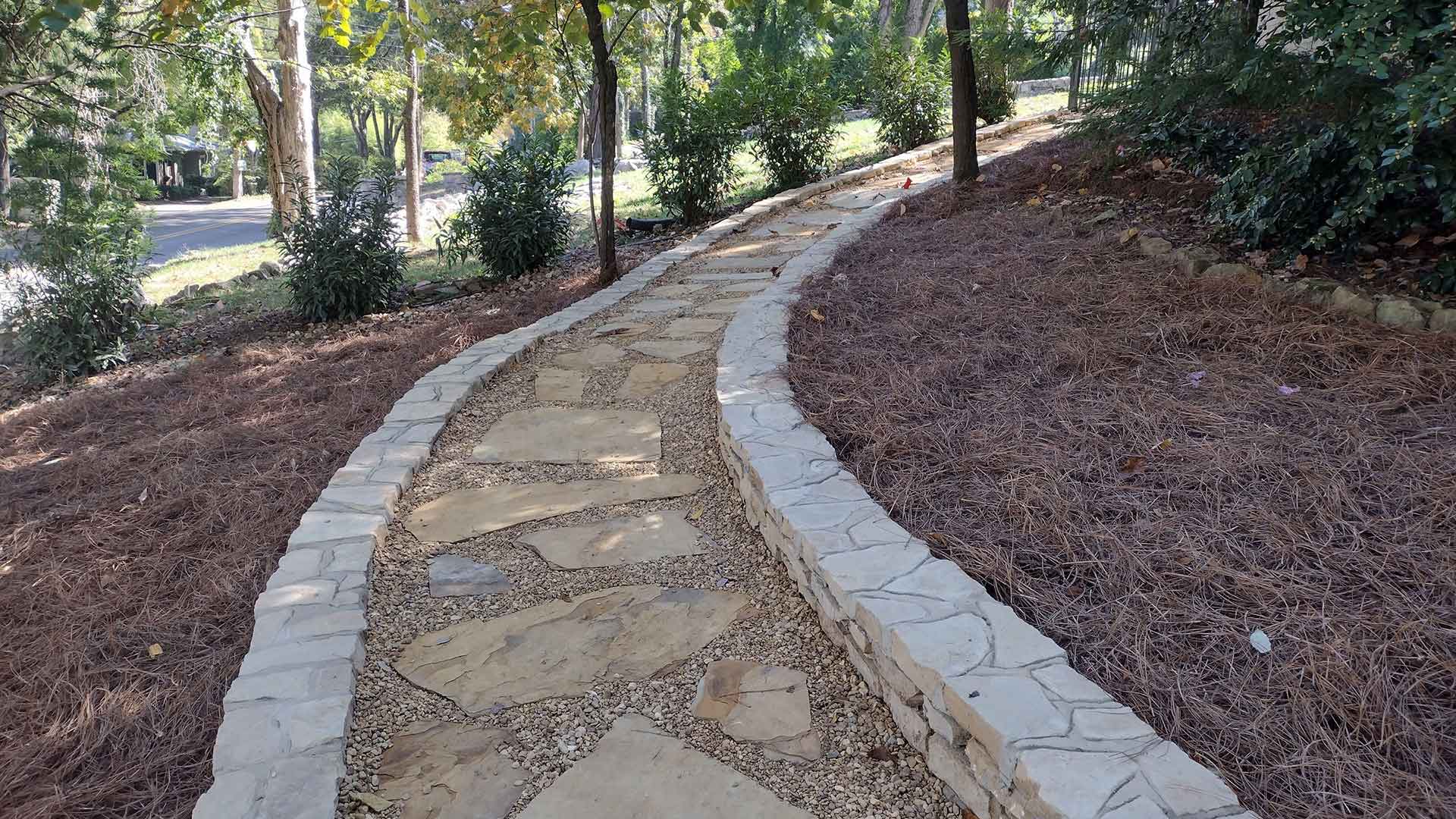 Walkway installed beside retaining wall in Winchester, TN.