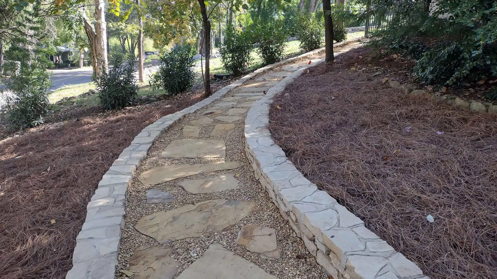 Walkway installed beside retaining wall in Winchester, TN.