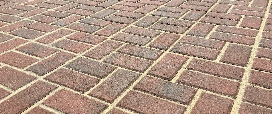 Brick patio in Huntsville, AL, with a basketweave pattern.