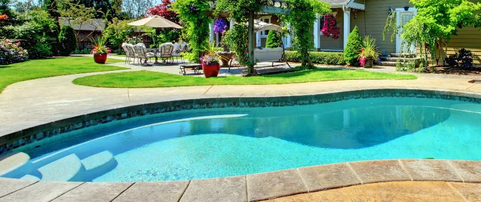 Outdoor space in Huntsville, AL, with a saltwater pool.