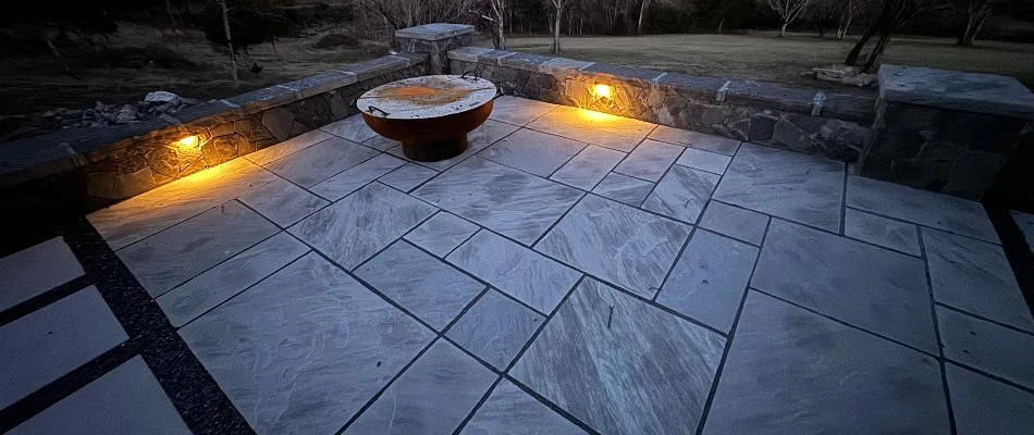 Paver patio in Huntsville, AL, with a seating wall.