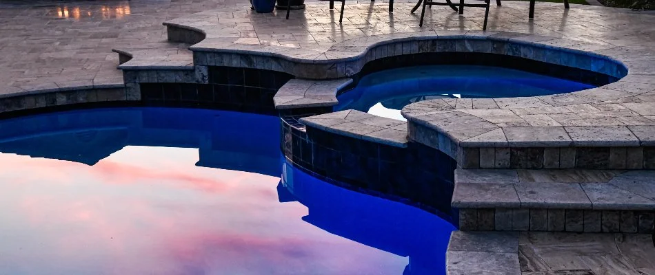 Pool in Huntsville, AL, with a built-in spa.