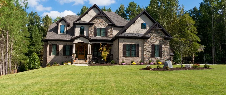 Freshly mowed lawn on a property in Huntsville, AL.