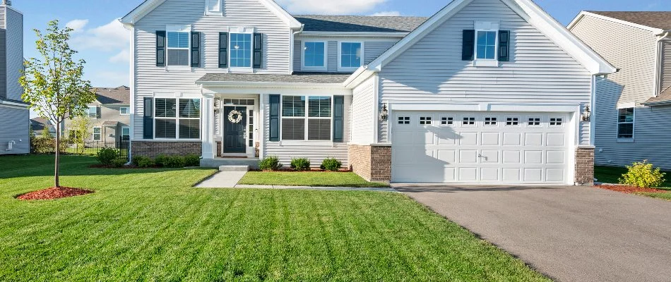 Mowed residential lawn on a property in Huntsville, AL.