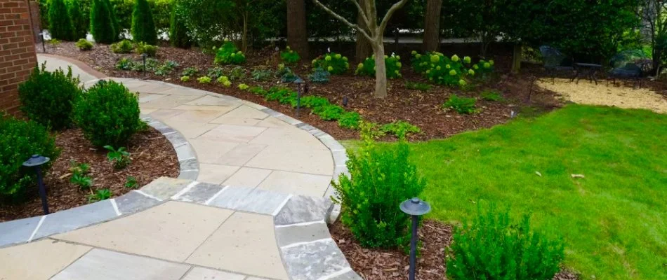 Walkway surrounded by nice landscaping in Boonshill, TN.