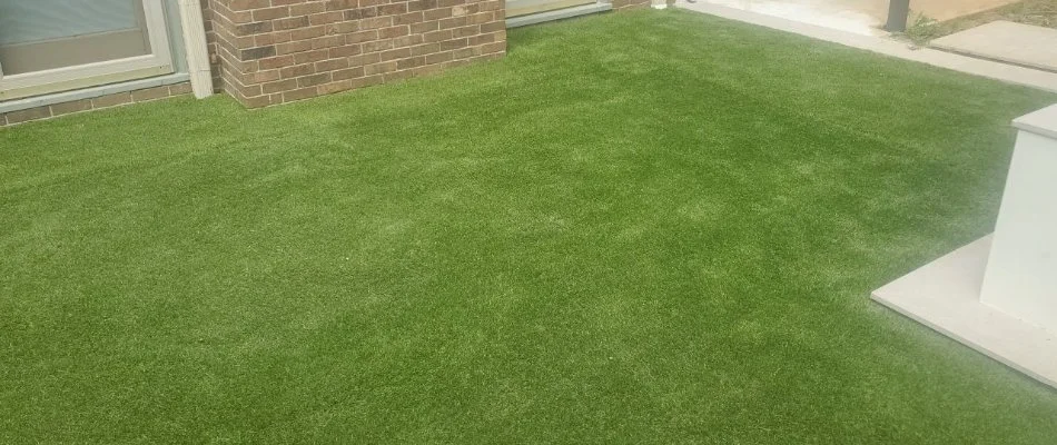 House in Fayetteville, TN, with synthetic grass.