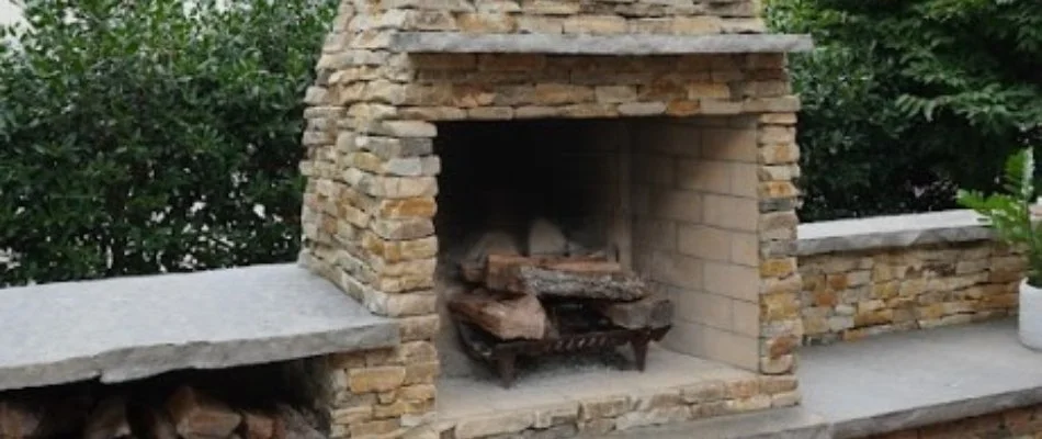 Wood-burning outdoor fireplace on a property in Huntsville, AL.